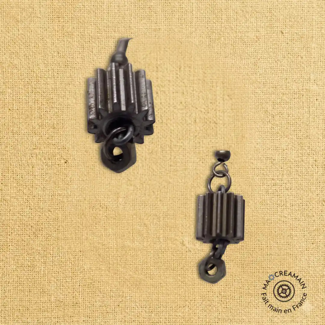 Boucles d'oreilles composé d'engrenage de moteur de volet roulant.